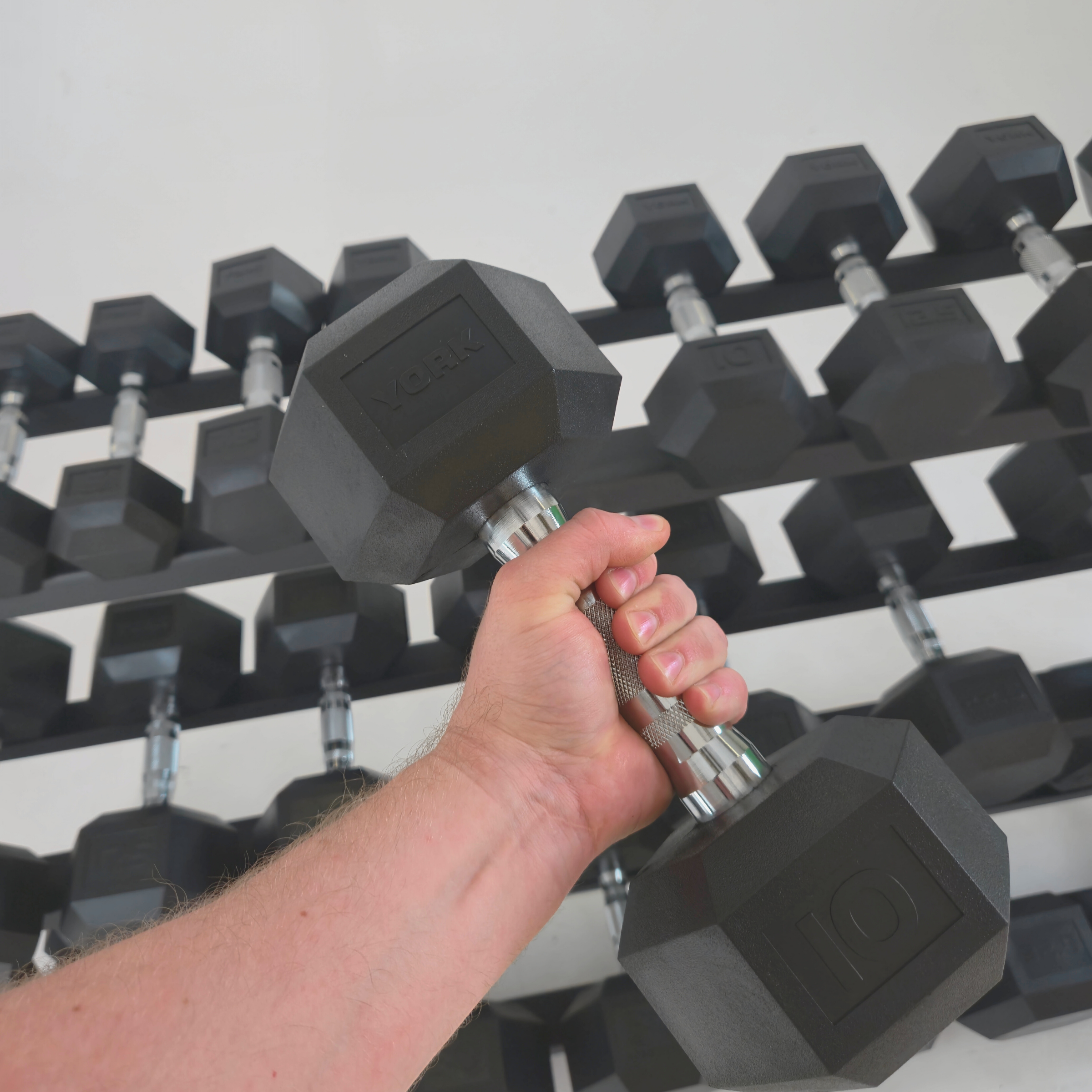 York Barbell Elite PRO Hex Dumbbells in hand professional grip